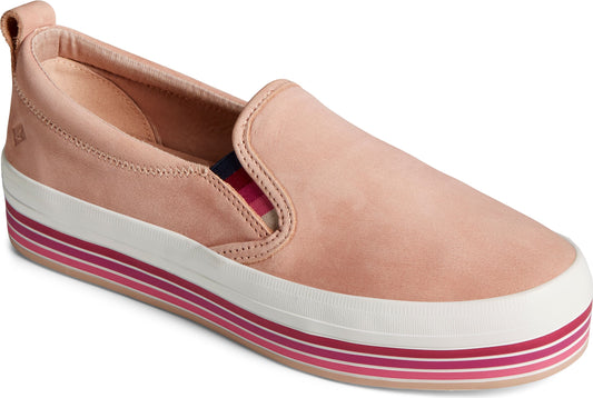 Pink leather slip-on sneaker with a white platform sole accented by pink stripes.