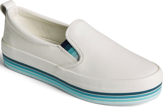 White leather slip-on shoe with blue striped platform.
