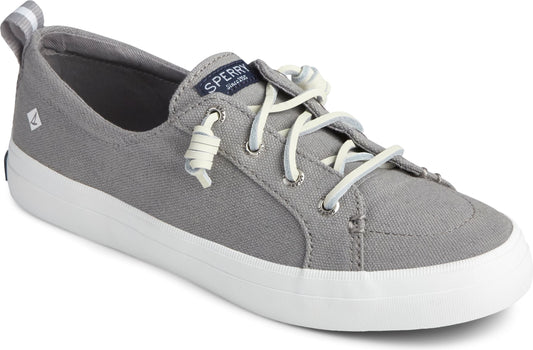 Gray canvas sneaker with white laces and sole, "SPERRY Since 1935" tag on the tongue.