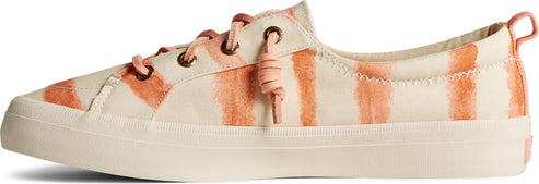 A low-top shoe with a white and orange tie-dye pattern and matching laces.