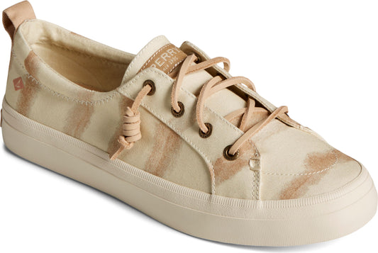Low-top canvas sneaker with tie-up laces and neutral camo pattern.