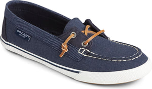 Blue canvas boat shoe with white sole and brown leather laces.