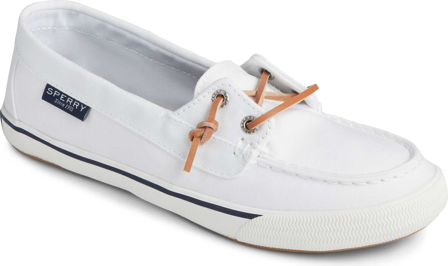 White canvas boat shoe with tan leather laces and a navy blue logo that reads "SPERRY since 1935".