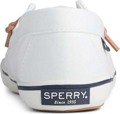 Rear view of white moccasin-style shoe with brown laces and visible 'SPERRY Since 1935' navy blue tag.