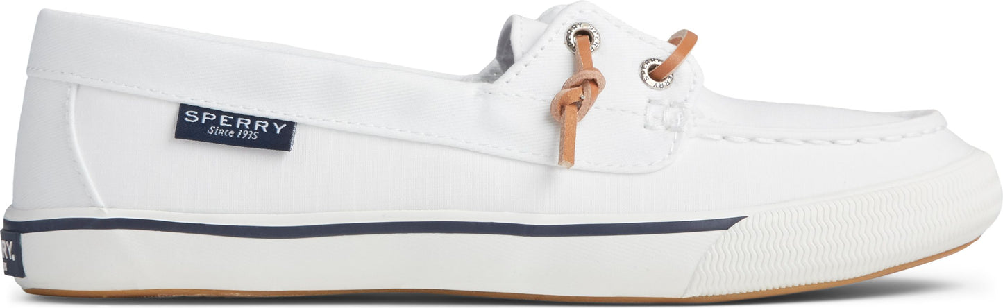 A white slip-on boat shoe with tan laces.