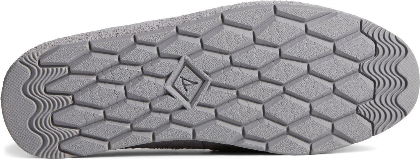 The sole of a shoe features a gray geometric pattern with a logo.
