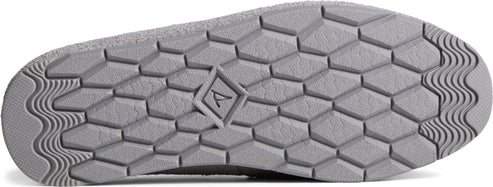 The sole of a shoe features a gray geometric pattern with a logo.