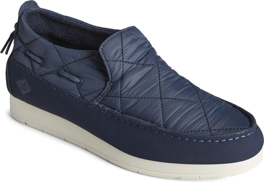 Navy quilted, slip-on shoe with white sole and back cord detail.