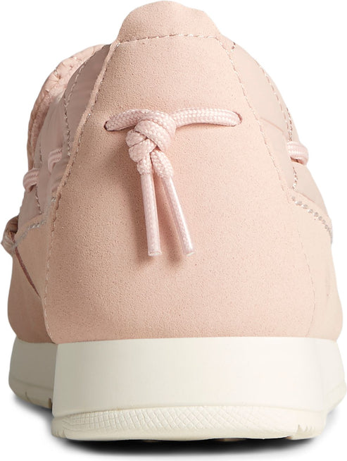 Light pink boat shoe with tied laces.
