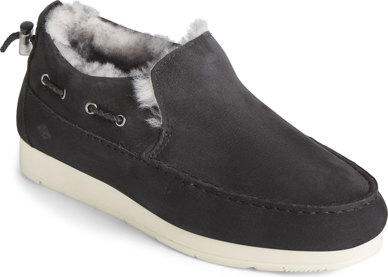 Black loafer-style shoe with fur lining and white sole.