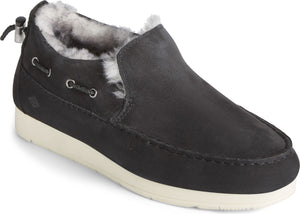 Black loafer-style shoe with fur lining and white sole.
