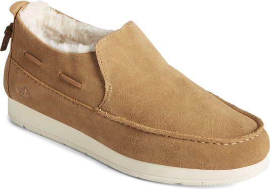 Tan suede slip-on loafer with white faux fur lining and white sole.
