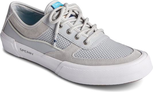 Low-profile lace-up sneaker in light gray suede and perforated leather with white sole, white laces and "SPERRY" logo on the side.