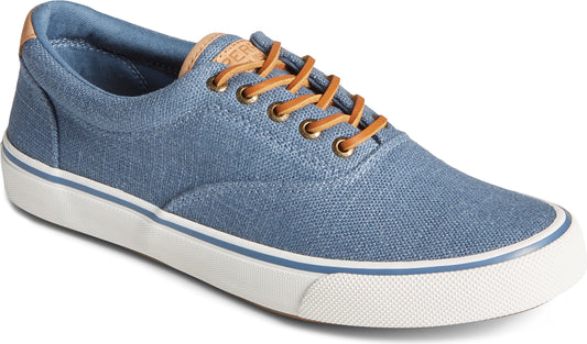 Blue canvas sneaker with leather laces and white sole.