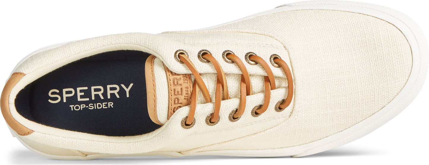 Off-white canvas shoe with brown leather laces and "SPERRY TOP-SIDER" printed on the inner sole.