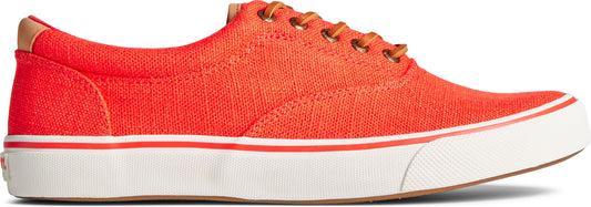 A low-profile, red canvas sneaker with a white sole and brown laces.