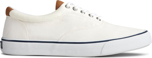 White canvas sneaker with brown accent on the heel and tongue.