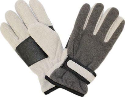A pair of winter gloves, one white with a black cuff and the other gray, laying on top of each other with fingers spread