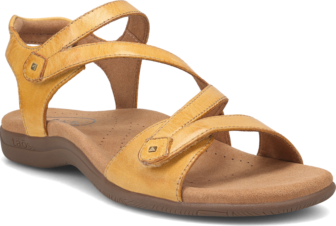 Yellow sandal with three adjustable velcro straps and a contoured footbed.