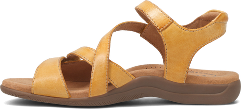 A sandal in tan leather with two straps crossing the foot.