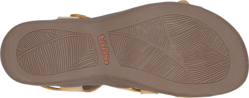 Sole of a sandal with leaf-like pattern and the text "taos".
