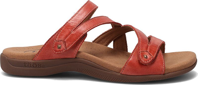Red leather sandal with three straps and adjustable closures.