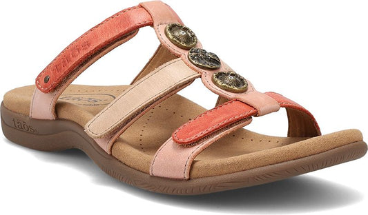 A sandal with two adjustable Velcro straps, decorative gold buttons, and light pink and orange accents.