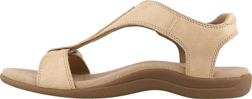 A tan sandal with an ankle strap.