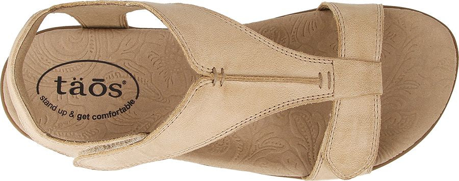 Tan leather sandal with three straps.