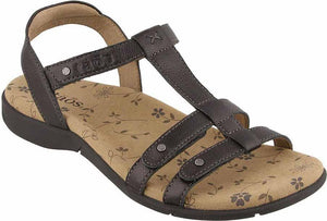 Dark grey leather T-strap sandal with floral patterned footbed and TAOS branding.