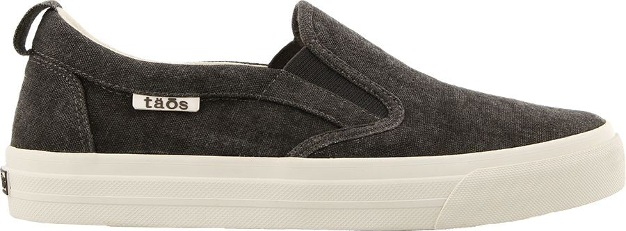 A dark grey slip-on shoe with white sole and a pull tab.