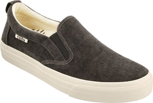 Slip-on sneaker with a dark gray canvas upper and a thick, textured, light-colored rubber sole.