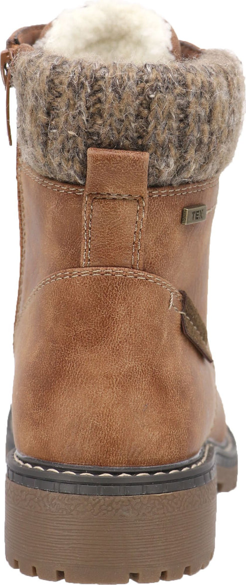 A brown boot with a knit upper and a thick sole.