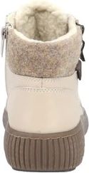 Beige ankle boot with a faux fur lining and ridged sole.