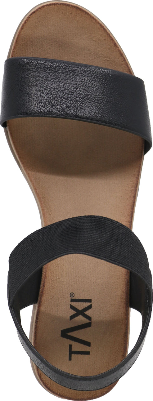 A sandal with two black straps and a brown footbed.