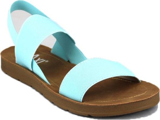 Aqua sandal with criss-cross elastic straps on a brown sole.
