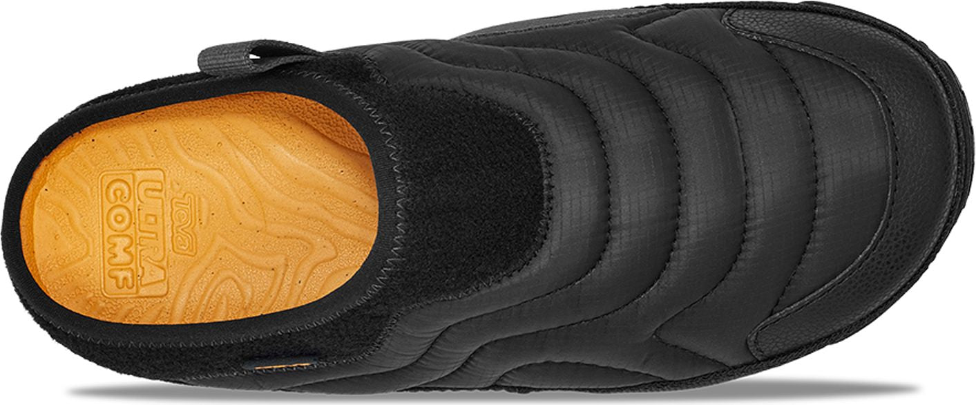 Black slipper with a textured design and tan insole.