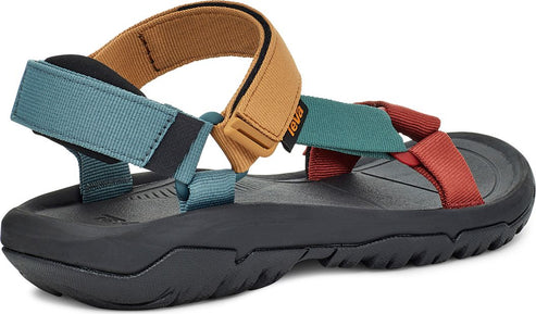 Sandals with a black sole and straps in red, brown, and blue
