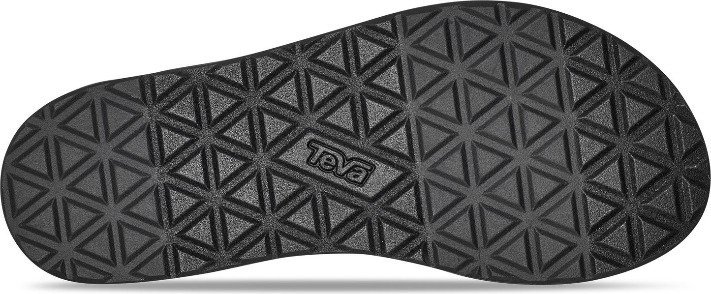 A shoe sole with a textured triangular pattern and the word "TEVA".