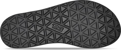 A shoe sole with a textured triangular pattern and the word "TEVA".