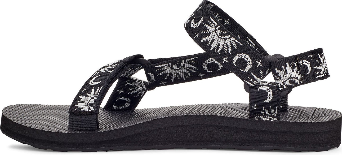 Black sandal with sun, moon, and star pattern on the straps.