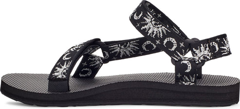 Black sandal with sun, moon, and star pattern on the straps.