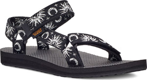 Black sandal with white sun and moon pattern straps.