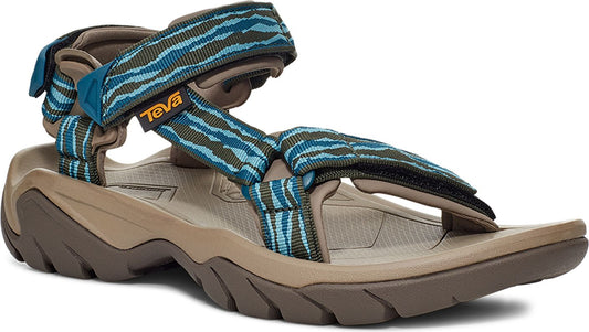Sport sandal with blue, green and brown patterned straps and brown sole.