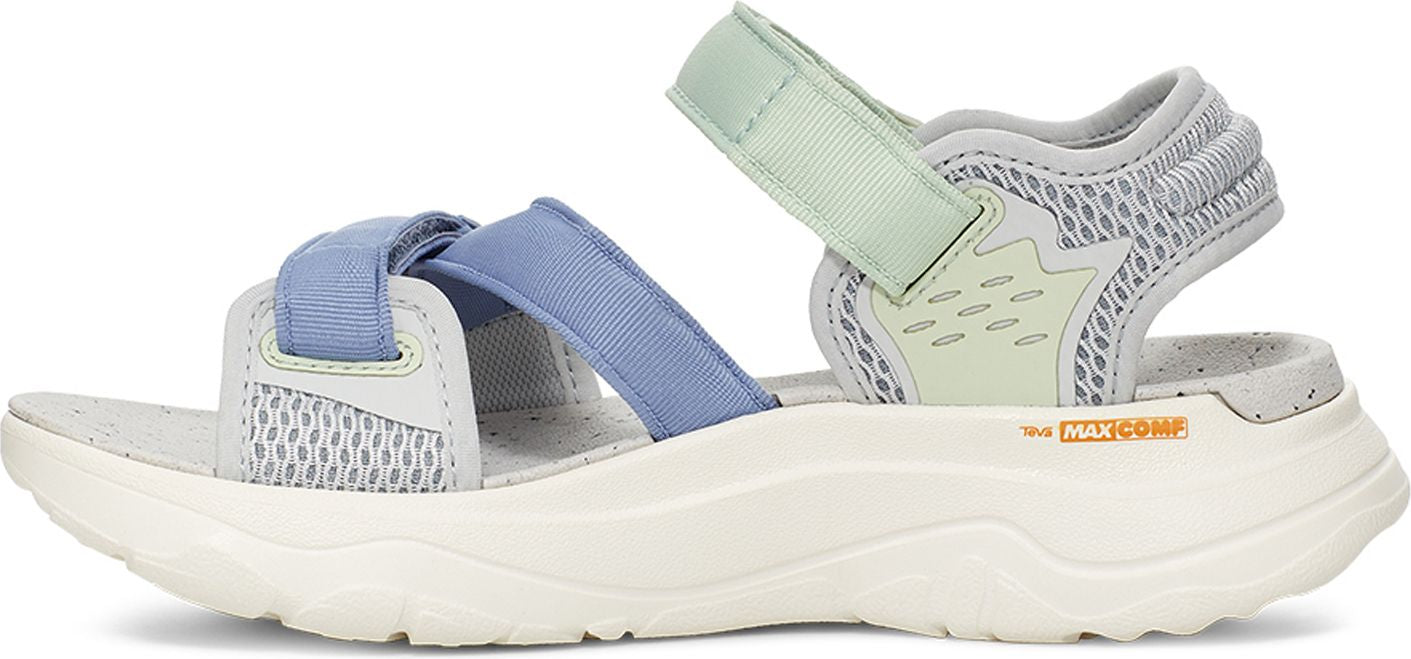 A sandal with light green and light blue straps on a white sole.