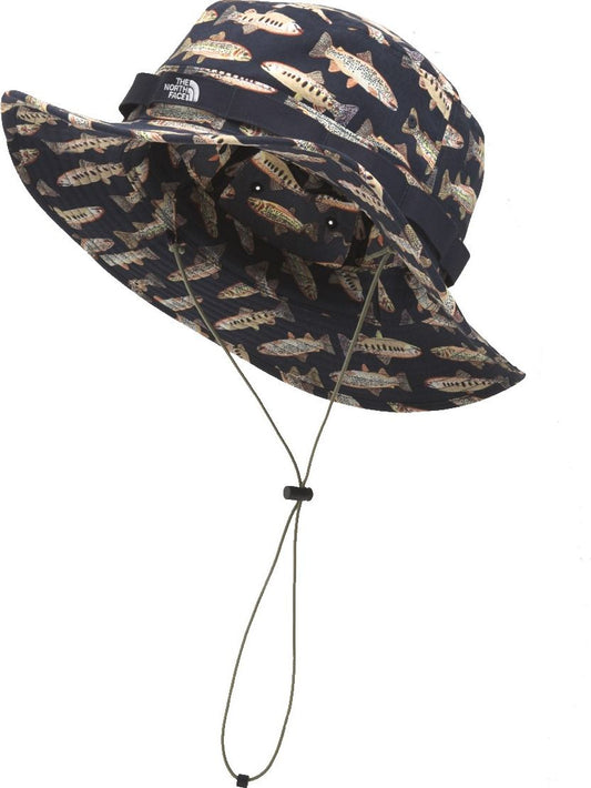 Floppy brim bucket hat with an all-over print of trout and an adjustable cord.