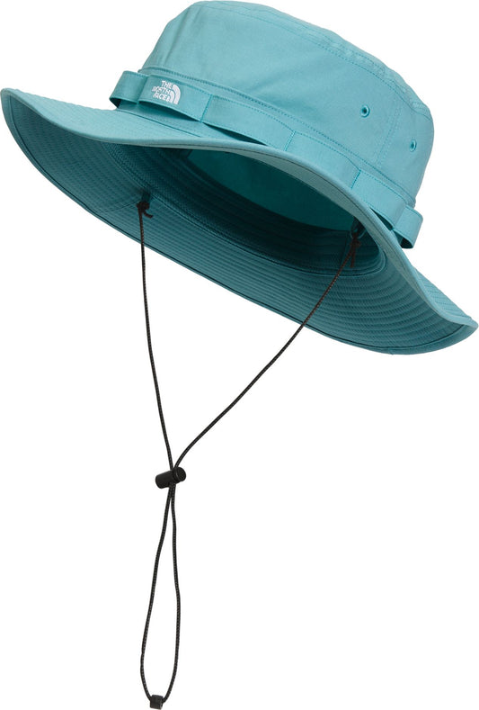A teal sun hat with a wide brim and a black drawcord.
