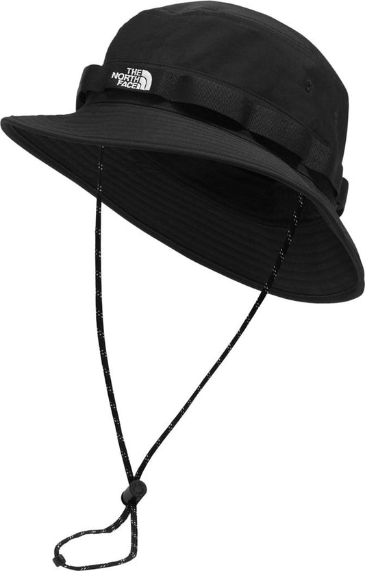 Black bucket hat with a logo on the band and an adjustable chinstrap.