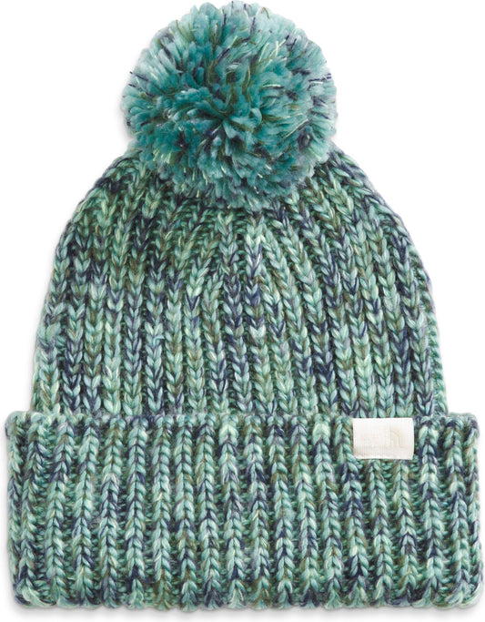 Knitted beanie hat in mottled green and blue with pompom and small white label