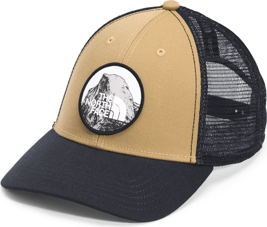 Black-brimmed tan and black trucker cap with a round emblem of a mountain peak and the words "THE NORTH FACE".